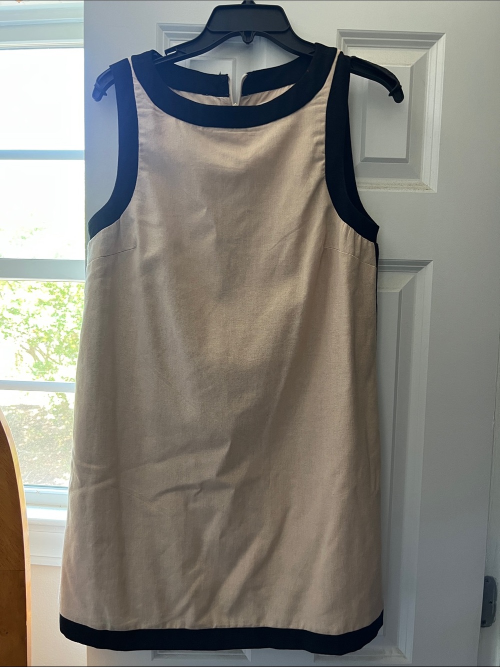 Sleeveless Cream Mini Dress with Black Trim